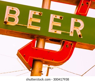 Neon Beer Sign With Red Arrow