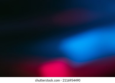 Neon blur glow  Color light overlay  Disco illumination  Defocused blue pink red ultraviolet radiance soft texture dark black abstract empty space background 
