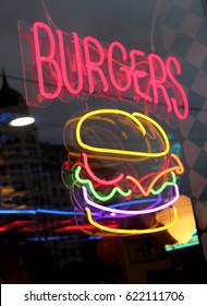 Neon burger on window 