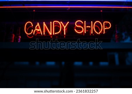 Similar – Foto Bild Rotes Neonschild mit Schriftzug Popcorn Cotton Candy