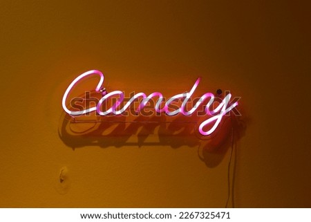 Similar – Foto Bild Rotes Neonschild mit Schriftzug Popcorn Cotton Candy