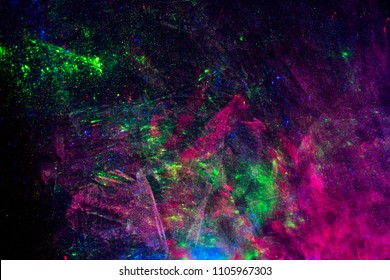 Neonfarben auf schwarzem Stoff, neonaler Hintergrund, Textur