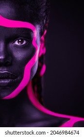 Neon Colors. Pink And Black Body Paint. Woman With Face Art. Young Girl With Colorful Bodypaint. An Amazing Afro American Model With Makeup.