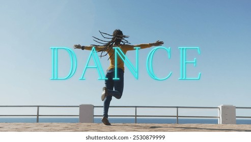 Neon dance text banner against african american woman dancing on the promenade. dance and hobby concept - Powered by Shutterstock