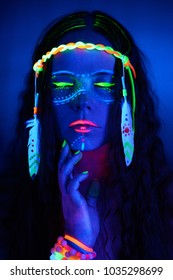 Neon Hippie Girl In Blacklight On Dark Background