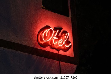 Neon Hotel Sign On The Wall