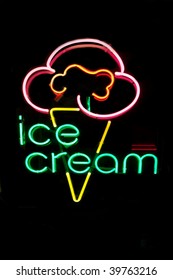 Neon Ice Cream Cone Sign At Night