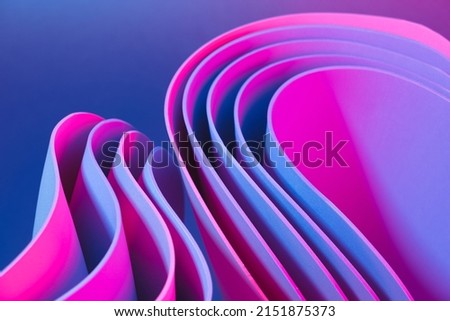 Neon illuminated dynamic sheets wallpaper. Abstract business background.