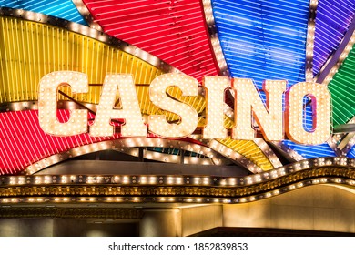 Neon Light Casino Sign At Night