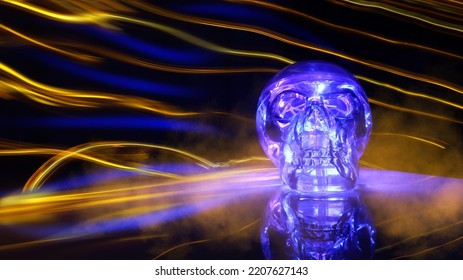 Neon Light Skull On A Dark Background. Halloween Background. Futuristic Light Lines, Bokeh.