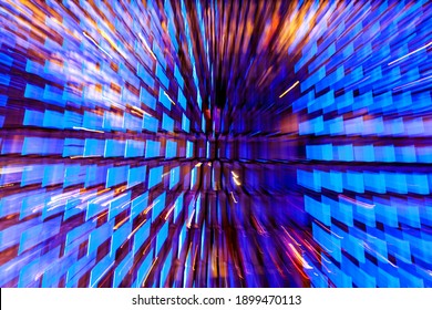 Neon light windows moving in to deep space on the center with zoom effect, bright blue and pink.  futuristic explosion of colors in the shape of blue windows. Modern futuristic. pattern-like scape - Shutterstock ID 1899470113