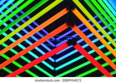 Neon Lights As A Background. Installation Of Neon Lines For The Design. An Art Installation Of Colored Lights. Photo In High Resolution.