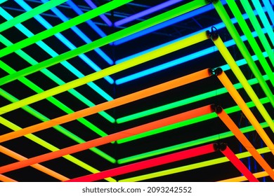 Neon Lights As A Background. Installation Of Neon Lines For The Design. An Art Installation Of Colored Lights. Photo In High Resolution.