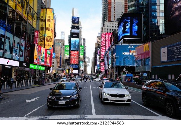 With its\
neon lights and billboards, Times Square is New York\'s most famous\
landmark and is the liveliest area in the city, located at the\
intersection of Broadway and 7th Avenue.\
