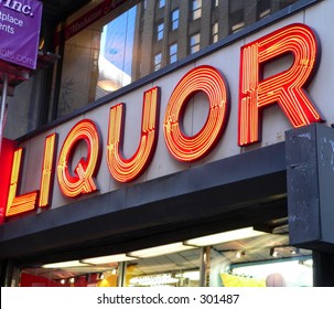 Neon Liquor Sign In Front Of Store