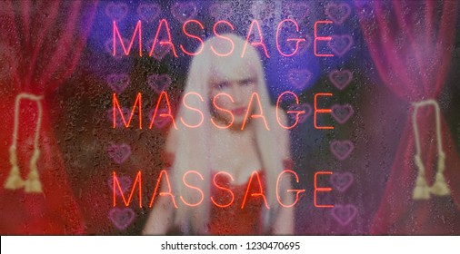 Neon Massage Sign With Sexy Woman in background. Rainy Window Image