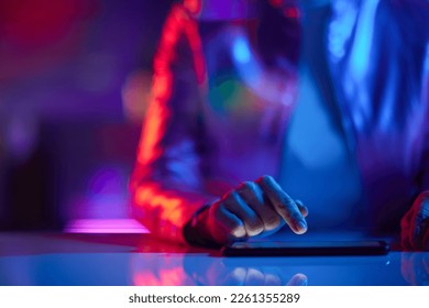 Neon metaverse futuristic concept. Closeup on business woman using smartphone applications in office.