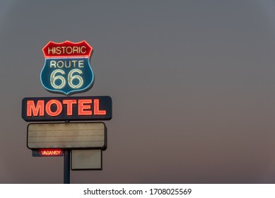 Neon motel sign on Route 66 in the evening. - Powered by Shutterstock