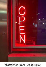 Neon Open Window Signage In A Byward Market Store Front Window Downtown Ottawa Ontario Canada.