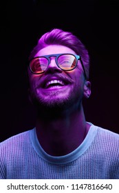 Neon Portrait Of Smiling Man Model With Mustaches And Beard In Orange Sunglasses And White T-shirt 