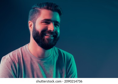 Neon Portrait Of A Young Attractive Man In The Studio. Close-up