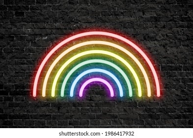 Neon Rainbow Sign On Black Grunge Brick Wall Background