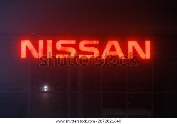 neon red sign Nissan on car dealership
center at foggy night - Tula, Russia, 02 11
2021
