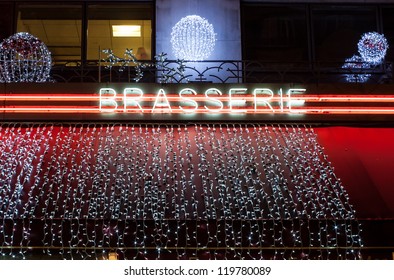 Neon sign of French bar at christmas time, Montparnasse, Paris - Powered by Shutterstock