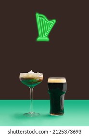 Neon Sign Of Green Harp Above An Irish Coffee With Milk Foam And Pint Of Black Stout Craft Beer Minimal Pub Concept. Plum Background.