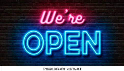 Neon sign on a brick wall - We are open - Powered by Shutterstock