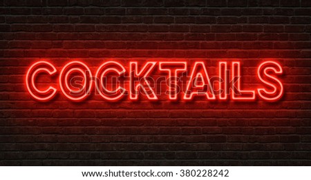 Neon sign on a brick wall - Cocktails