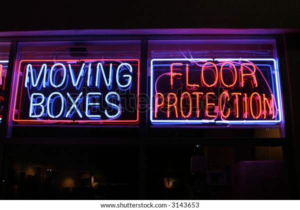 Neon Sign Series Moving Boxes Floor Stock Photo Edit Now 3143653