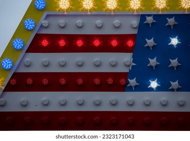 Neon sign symbolizing the US flag. White red and blue light. The joy and energy of the people of the United States. - Powered by Shutterstock