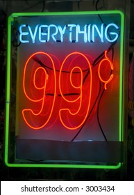 Neon Sign In Window Of 99 Cent Store