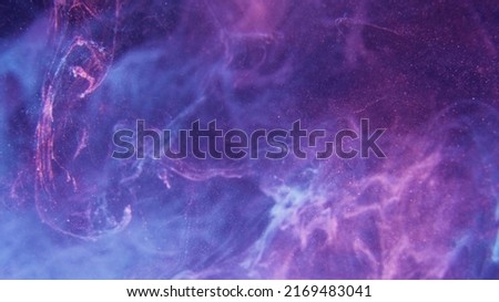 Neon smoke texture. Ink water splash. Aura haze. Fluorescent light purple pink blue color gradient fog cloud abstract art empty space background.