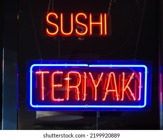 Neon Window Sign For Sushi And Teriyaki In Close Up