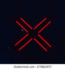 Neon X Alphabet Logo In Red Light