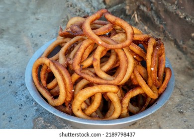 Nepali homemade, ring-shaped rice bread doughnut called sell roti close up