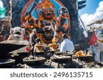 Nepali people worship to the Kaal Bhairav shrine in Kathmandu Durbar Square. Kaal Bhairav is believed to be a frightening incarnation of Lord Shiva.