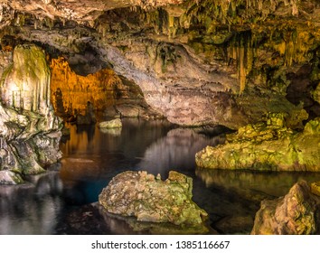 Neptune's Grotto (Grotta di Nettuno) a natural stalactite cave near Alghero , Sardinia, Italy. Accessible when the waters are calm by a steep stairway cut into the cliff or by boat from Alghero.