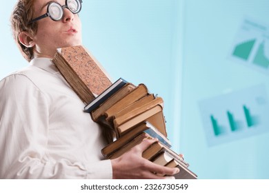 A nerd with an awkward and embarrassed expression, humorously overloaded with book knowledge but socially inept - Shutterstock ID 2326730549