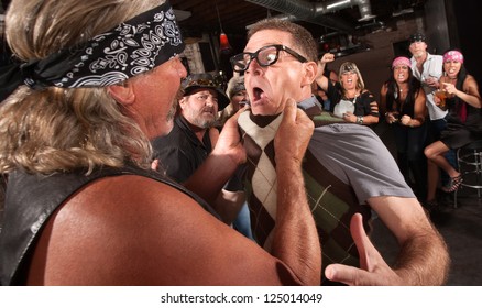 Nerd grabbed by collar in bar fight with tough gang member