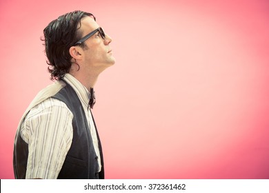 Nerd Man With Glasses Side View Portrait On Pink