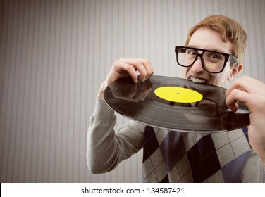 Nerd Student Angry, Biting A Vinyl Record