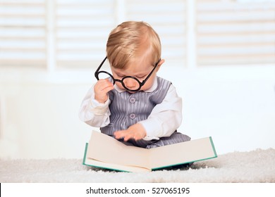 Nerdy Baby Boy Reading A Book