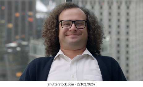 Nerdy Looking Manager Enjoying Promotion, Sitting At His New Working Desk