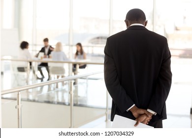 Nervous African American Employee Standing In Hallway Waiting To Enter Business Meeting, Worried Black Presenter Anxious About Making Presentation For Colleagues Or Workers In Boardroom