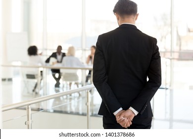 Nervous Businessman Waiting To Enter At Business Meeting Rear View, Male Employee, Presenter, Speaker Worried About Presentation For Colleagues In Boardroom, Applicant Waiting Interview In Hallway