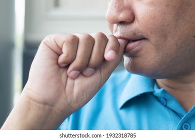 Nervous Man Biting His Nail, Emotional Pressure Concept