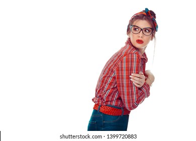 Nervous scared neurotic woman looking back. Closeup portrait of a beautiful girl in red checkered shirt and jeans with retro bow on head isolated on white background. Mixed race, hispanic, caucasian